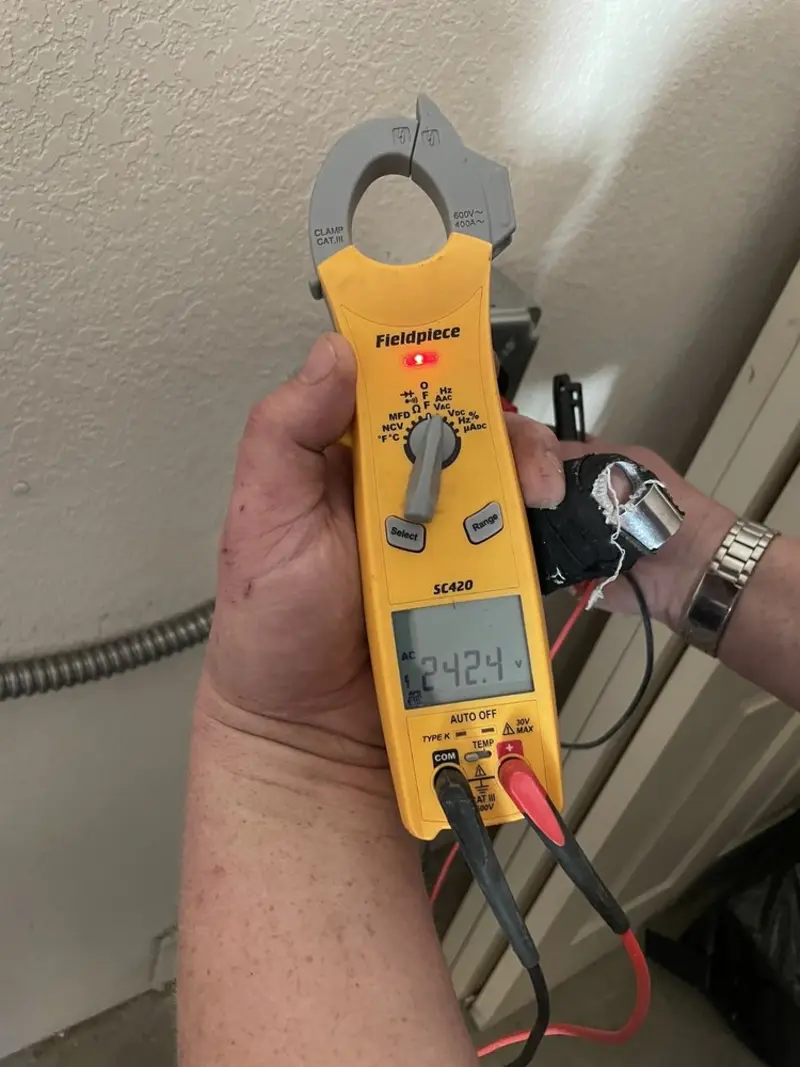 Voltage testing with clamp meter during Generator Installation in Buena Vista